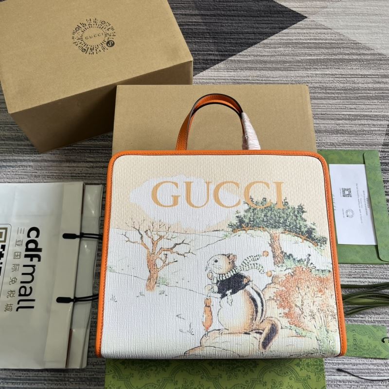 G*u*i shopping bags